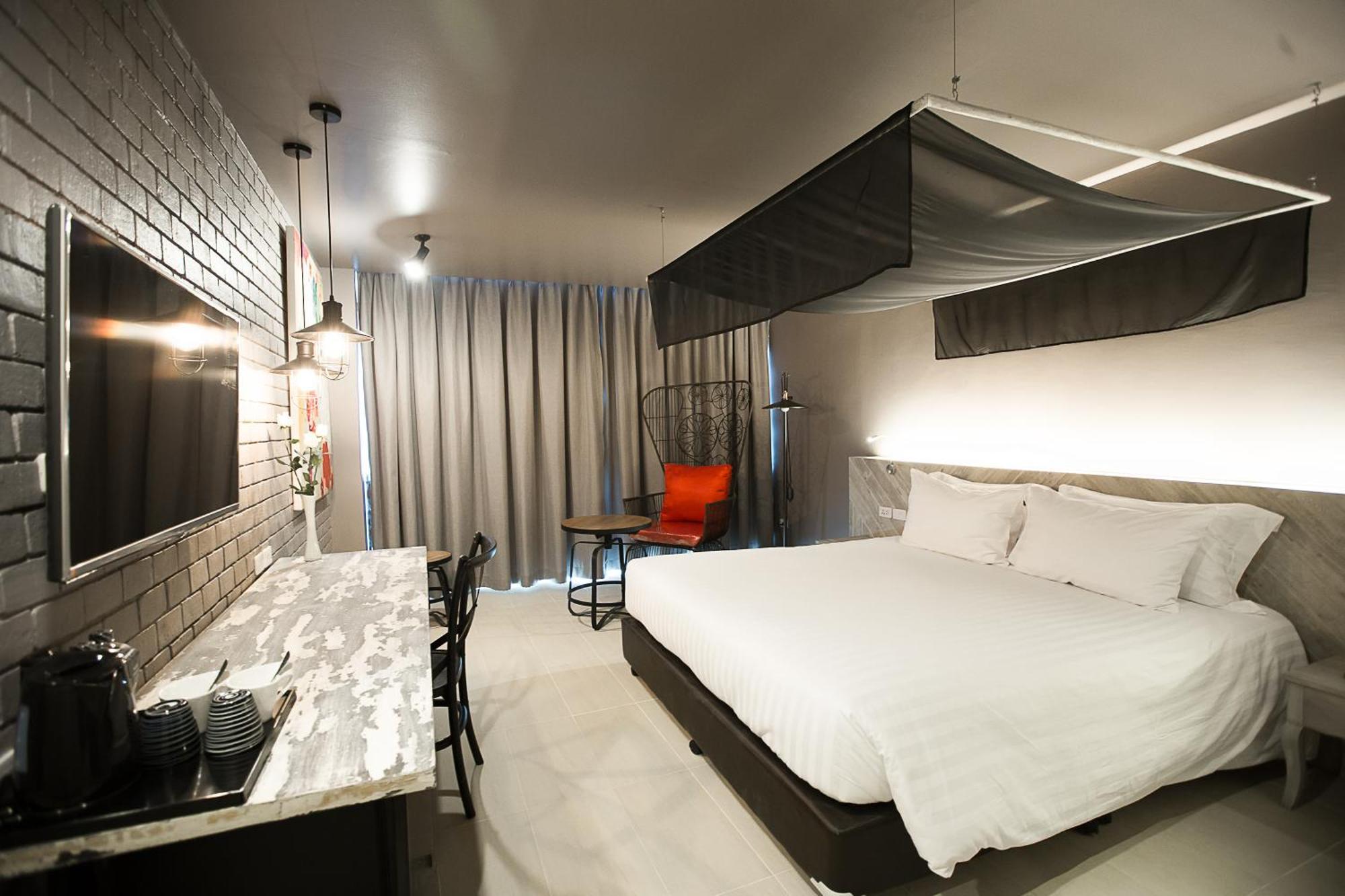 Art Mai Gallery Nimman Hotel شيانغ ماي المظهر الخارجي الصورة A room at the hotel
